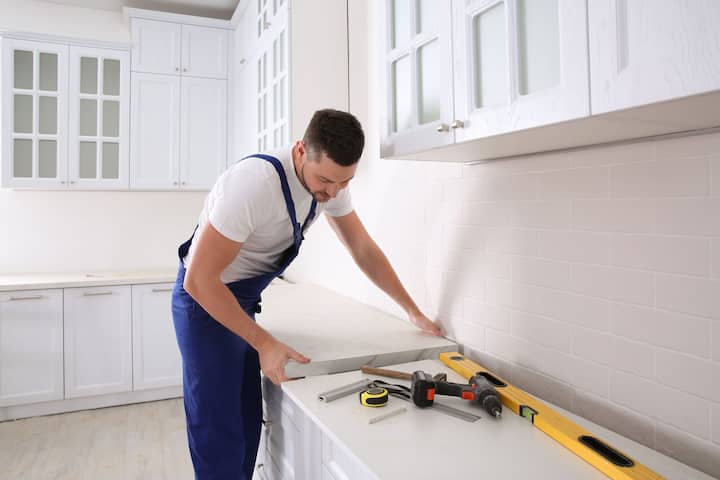 A kitchen countertop made of a durable and stain-resistant material, designed for easy maintenance in Chester County